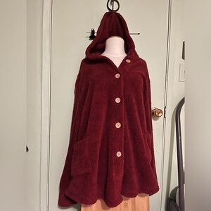 Red fuzzy warm sweater with hood and pockets